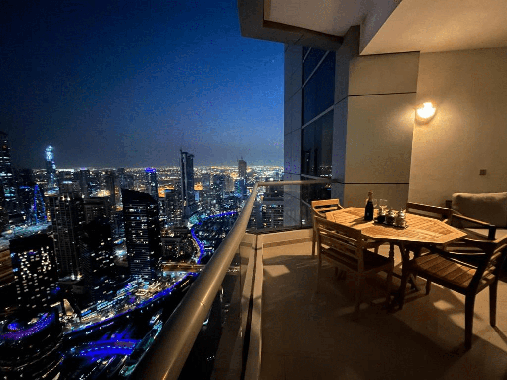 A stunning picture of a midnight scene from the balcony of a luxury apartment in Dubai.